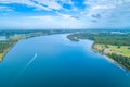 Aerial landscape of boat sailing on the Manning River. Royalty Free Stock Photo