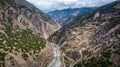 Aerial landscape of a highway road in the mountains in the Mangkang Royalty Free Stock Photo