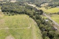 Aerial landscape over fields, bushland, homes and roads leading into a well known valley gorge, Finch Hatton, Queensland, Royalty Free Stock Photo