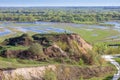 Aerial landscape panorama view on Desna river with flooded meadows and fields. View from high bank on annual spring