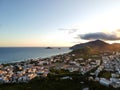 Aerial landscape photo of Recreio dos Bandeirantes beach during sunset, with views of Prainha and Grumari in the