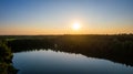 Serene Sunset over a Tranquil Forest Lake Royalty Free Stock Photo