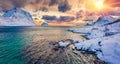 Colorful winter view from flying drone of Vik Beach after huge snowfall.