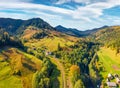 Aerial landscape photography. Sunny autumn view from flying drone of Bystrets` village. Royalty Free Stock Photo