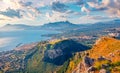 Aerial landscape photography. Sunny morning view of Bagheria town and national park Orientata Pizzo Cane.