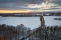 Aerial landscape of the road through snowy forest at winter, Poland Royalty Free Stock Photo