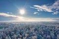 Aerial landscape of the road through snowy forest at winter, Poland Royalty Free Stock Photo