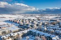 Aerial landscape of the road through snowy Rotmanka village at winter, Poland Royalty Free Stock Photo