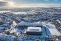 Aerial landscape of the road through snowy Rotmanka village at winter, Poland Royalty Free Stock Photo