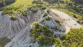 Aerial landscape Sand Hills of Quarry With a Pond and Abandoned Prison in Rummu Estonia Europe.