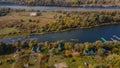 Aerial landscape of small settlment near the forest and river Royalty Free Stock Photo