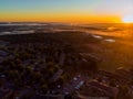 Aerial landscape of streets and residential area a height view from above panorama sunrise with fog Royalty Free Stock Photo