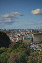 Aerial landscape view of ancient Podil neighborhood. Streets with colorful buildings against blue sky