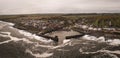 Aerial landscape view of Craster Harbour and village in Northumberland Royalty Free Stock Photo