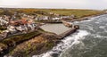 Aerial landscape view of Craster Harbour and village in Northumberland Royalty Free Stock Photo