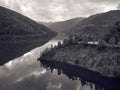 Aerial view of a mountain lake and a road. Black and white Royalty Free Stock Photo