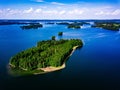 Aerial landscape view over blue lakes with islands and green forests in Finland Royalty Free Stock Photo