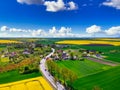 Aerial landscape of the yellow rapeseed field under blue sky, Poland Royalty Free Stock Photo