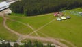 Aerial Large group of beautiful kids boys and girls running with kids in the park. Kite Carefree Activity Summer Joyful