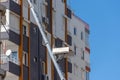 Aerial lift platform on a truck, a straightened lift arm and a lifting platform for lifting goods to the upper floors, for example