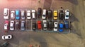 Aerial. Little city parking lot with colorful cars.