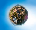 Aerial little planet view of Sleeping area on the outskirts of the city. View of the Vesuvius volcano. Houses, streets and parked