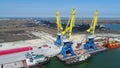 Aerial loading the Containers by crane , Trade Port , Shipping. Cranes for loading, unloading and sorting of containers