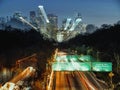 Aerial long exposure shot of the highway road leading to Los Angeles at night