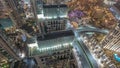 Aerial look down view of a big futuristic city night timelapse. Business bay and Downtown Royalty Free Stock Photo