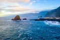 Aerial Madeira island view with Atlantic ocean, white waves, cliffs, and green nature Royalty Free Stock Photo