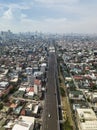 Aerial of the Metro Manila Skyway, a large elevated highway in Metro Manila cutting through the megacity