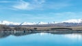 Mountain and farming country views of the shores of Lake Tekapo area near Roundhill Ski area