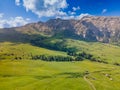 Aerial of a mountainous landscape in the Dolemites.