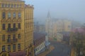 Aerial mystery foggy landscape view of Andriyivskyy Descent. Building called the Richard\'s-Lion Heart Castle in the fog