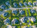 Aerial of new construction luxury residential neighborhood street single family homes real estate