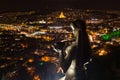 Aerial night drone view of Mother of Georgia Kartlis Deda on Sololaki hill in Tblisi Georgia at night