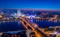 Aerial night panorama of the illuminated Hohenzollern bridge over Rhine river. Beautiful cityscape of Cologne, Germany Royalty Free Stock Photo