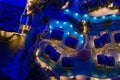 Aerial night photo of the beautiful blue colors at the Seminole Hard rock resort hotel pool deck