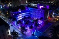 Aerial night photo Clevelander Miami Beach hotel and disco club neon blue lights