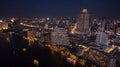 Aerial night scene of bangkok sky scraper beside chaopraya river Royalty Free Stock Photo