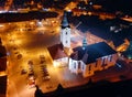 Aerial night shot of the church of St. Nicholas in Dobrany near Pilsen. Royalty Free Stock Photo