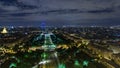 Aerial Night timelapse view of Paris City and Field of Mars shot on the top of Eiffel Tower Royalty Free Stock Photo