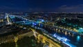 Aerial night timelapse view of Paris City and Seine river shot on the top of Eiffel Tower Royalty Free Stock Photo