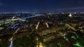 Aerial Night timelapse view of Paris City and Seine river shot on the top of Eiffel Tower Royalty Free Stock Photo