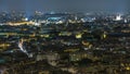 Aerial night timelapse view of Paris City and Seine river shot on the top of Eiffel Tower Royalty Free Stock Photo