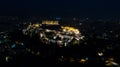 Aerial night video of iconic ancient Acropolis hill and the Parthenon at night, Athens historic center Royalty Free Stock Photo