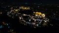 Aerial night video of iconic ancient Acropolis hill and the Parthenon at night, Athens historic center Royalty Free Stock Photo