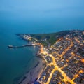 Aerial night view of the famous travel destination, Swanage, Dorset, South West England. blue hour winter Royalty Free Stock Photo