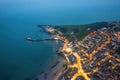 Aerial night view of the famous travel destination, Swanage, Dorset, South West England. blue hour winter Royalty Free Stock Photo