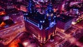 Aerial night view of an illuminated historic building in an urban setting with city lights in Liverpool, UK Royalty Free Stock Photo